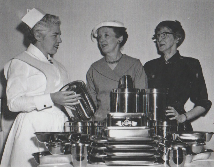 Presentation of stainless steel items to Regional Hospital nurse by Auxiliary members March 1958
